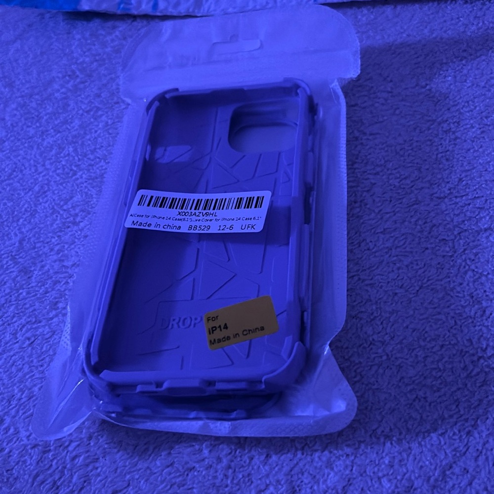 Good condition iPhone 14 otter box case in purple